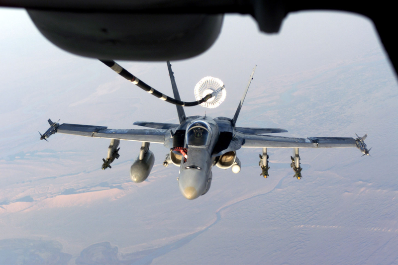 F/A-18C with three bombs, one wing tank, and targetting pods, refuels on the way to striker al quesadillas... Ur.... Qaeda. November 7th, 2001